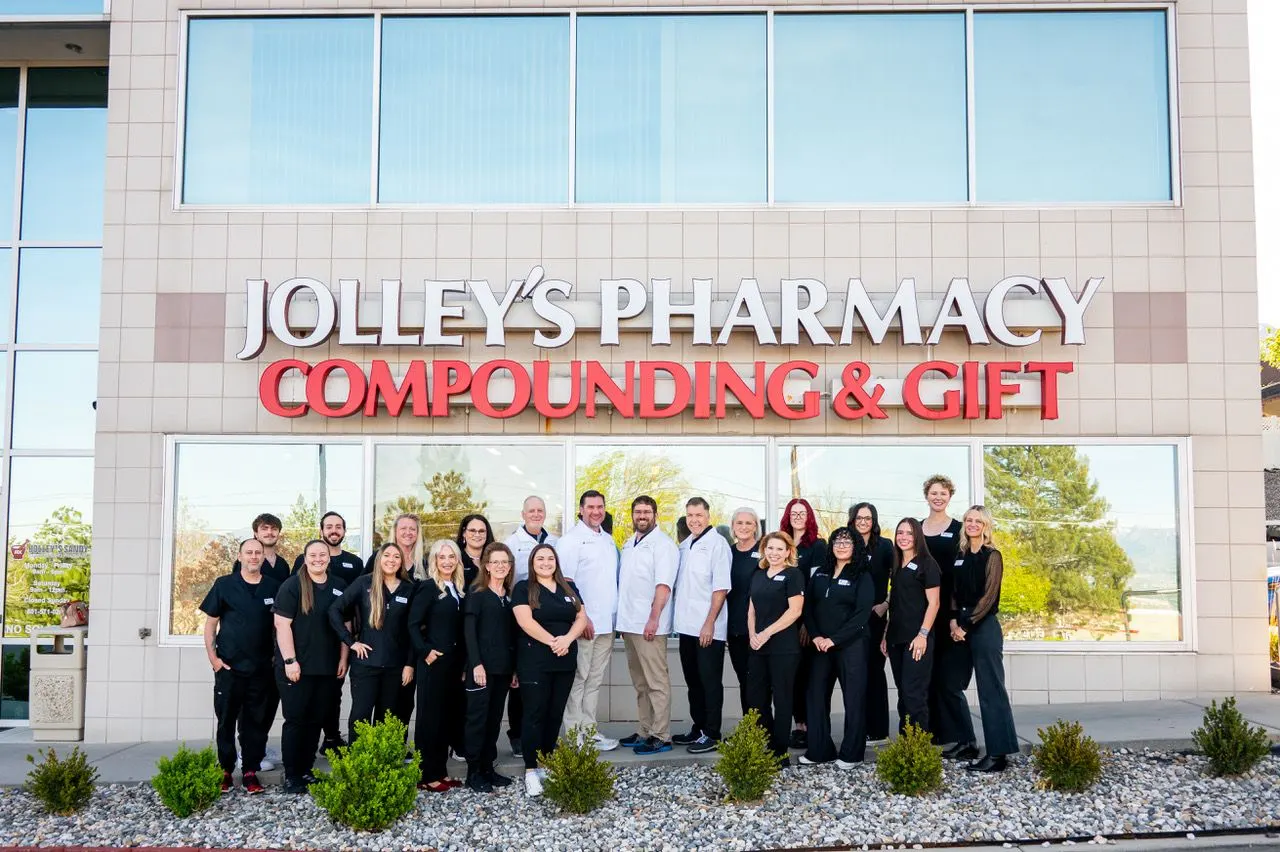 The Jolley's Sandy Pharmacy team standing together in the pharmacy